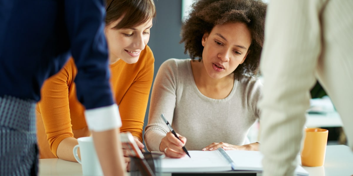 Two marketing professionals looking at documents