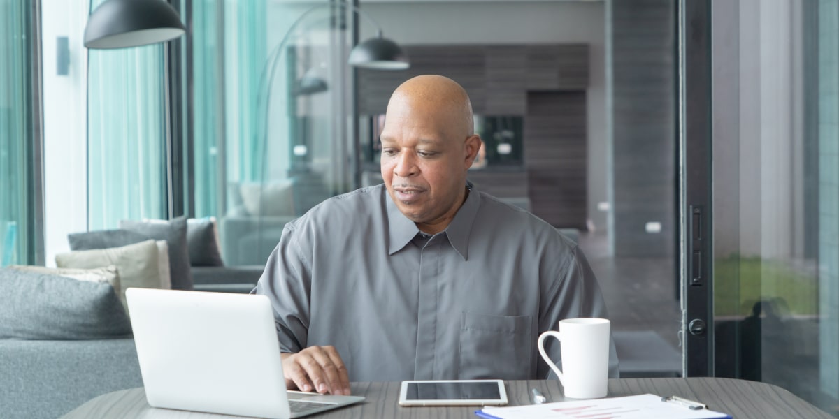 An aspiring social media specialist working at a desk