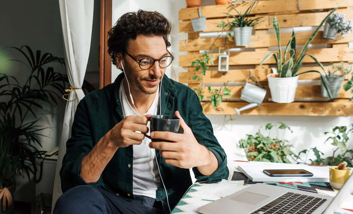 A UI designer at his work from home desk