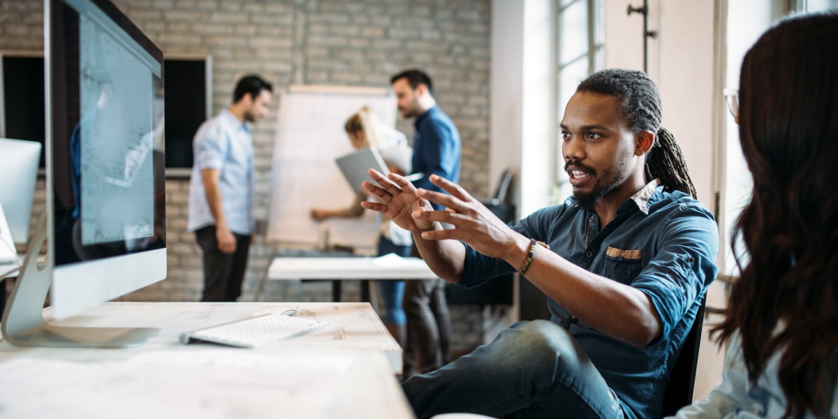 Data analysts working together in an office