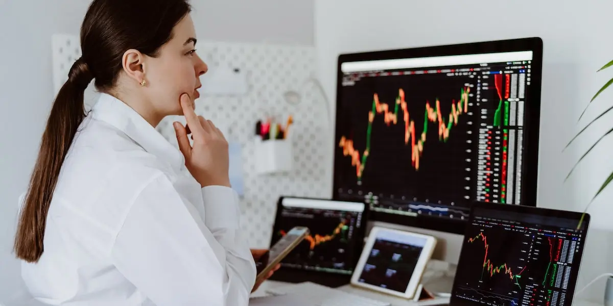 big data visualization analysis Big data analyst looking at visualizations on several monitors