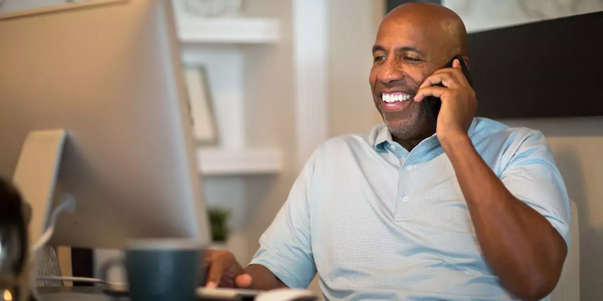 Healthcare data analyst talking on the phone