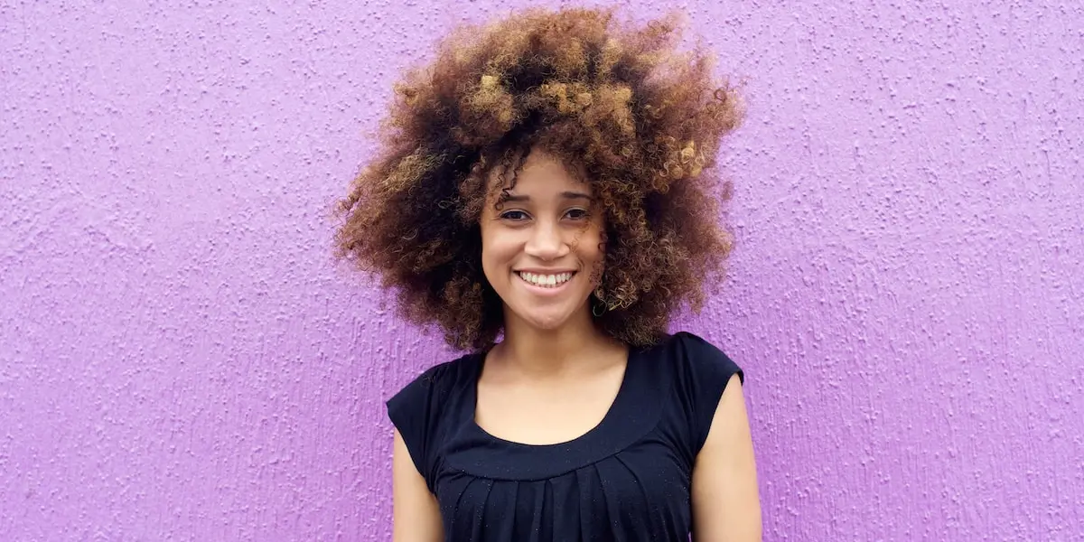 A freelancer smiles for the camera