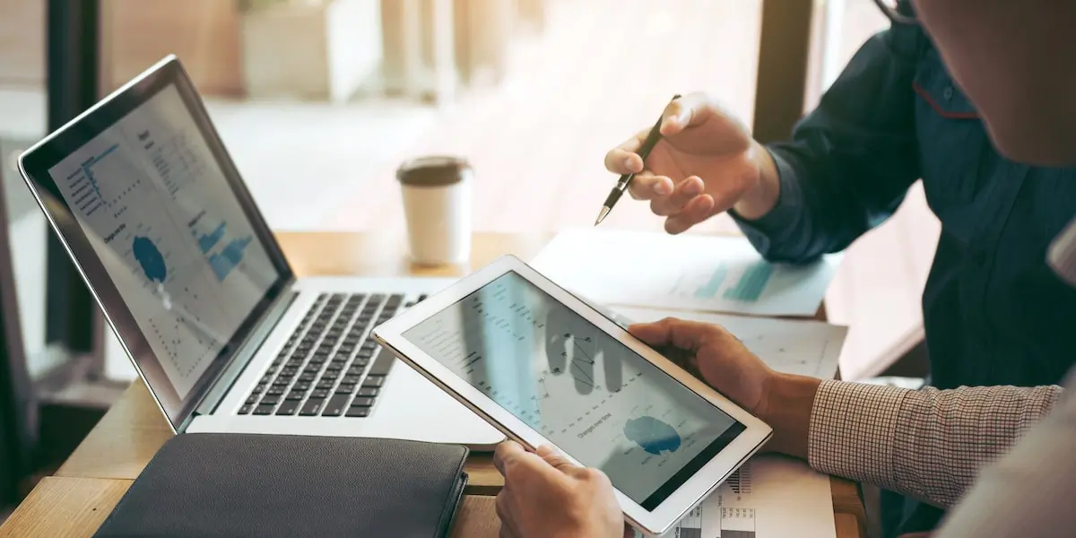 data analyst students working together Data bootcamp students working together on data visualizations