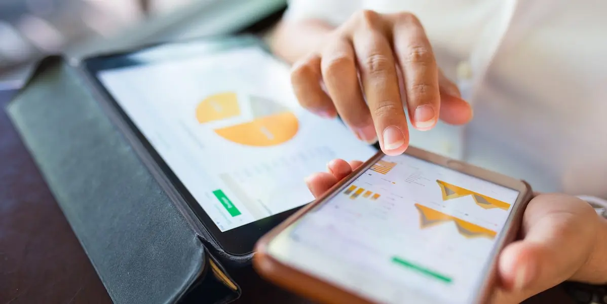 data visualizations What is data analytics? Here, data visualizations are shown on a tablet and a smartphone