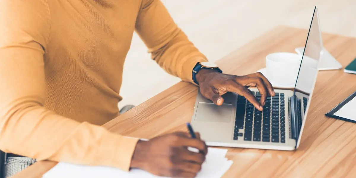 Digital marketing jobs content creator A content creator typing on a laptop