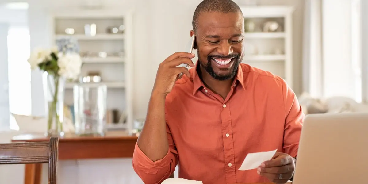 Digital marketing salary based on location A digital marketing manager on the phone, smiling