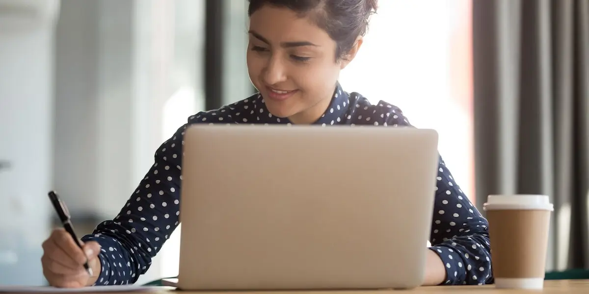 Job seeker writing their business analyst resume