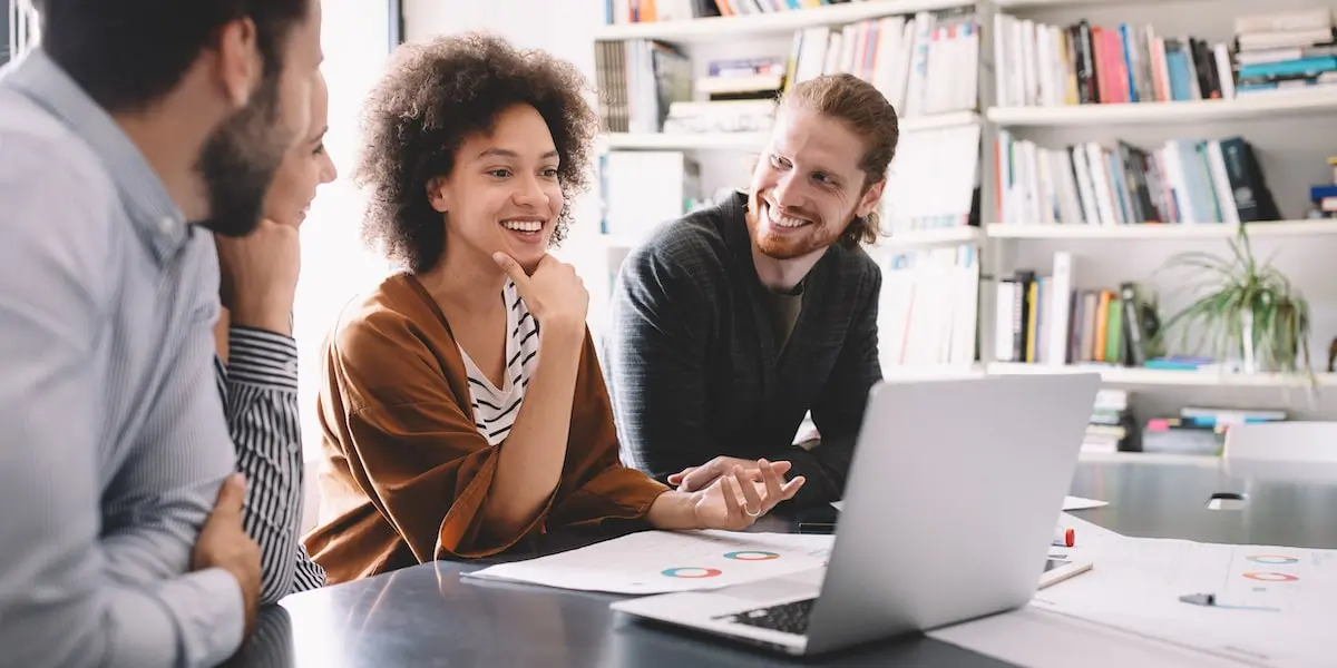 Marketing professionals work together on a multichannel and cross-channel marketing strategy