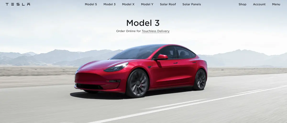 Tesla Homepage Screenshot of the Tesla homepage, with a car dominating the screen, an example of visual hierarchy.
