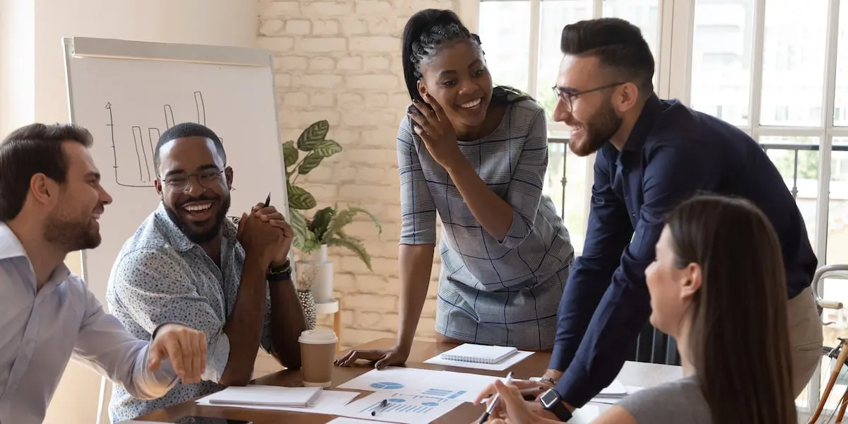 A product manager using WSJF to decide on the team's workflow in a meeting.