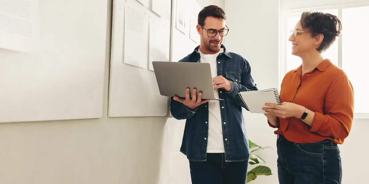 A product manager dealing with a stakeholder in a startup office.