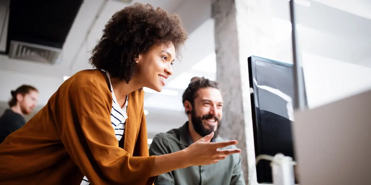 two IT workers at their entry level IT jobs