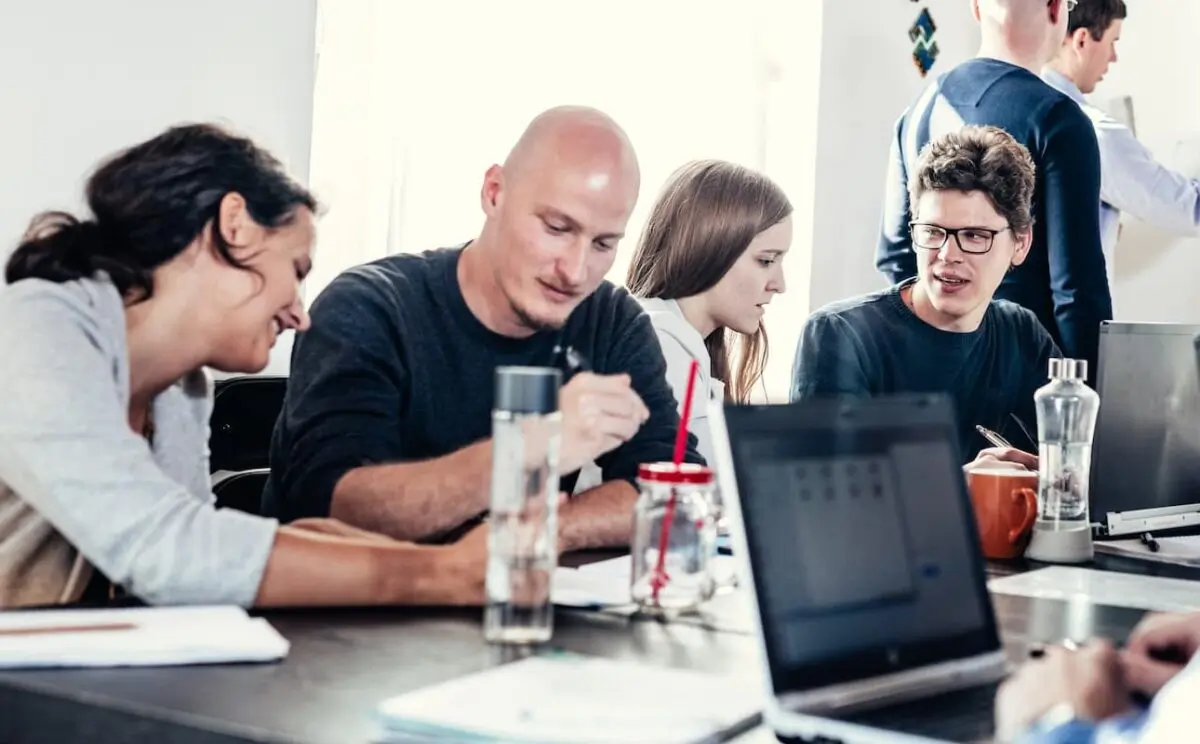 Diverse students taking a data bootcamp in Berlin.