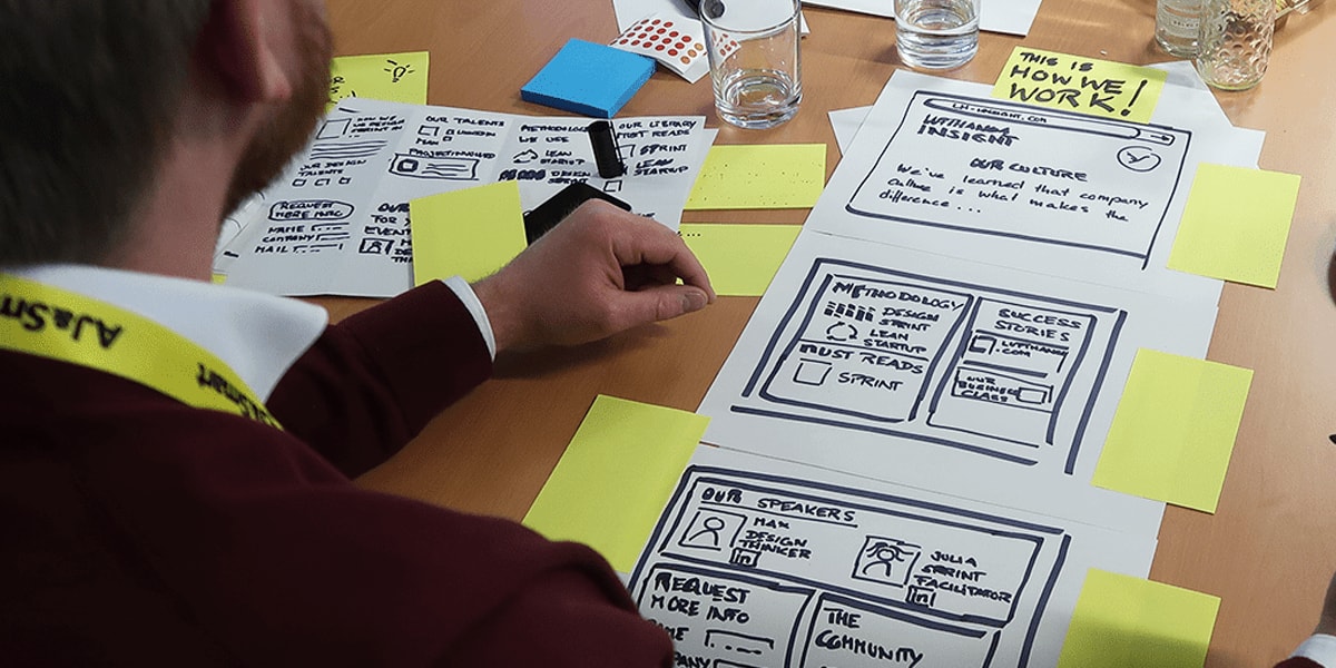 UX designer working on wireframes UX designer working on wireframes