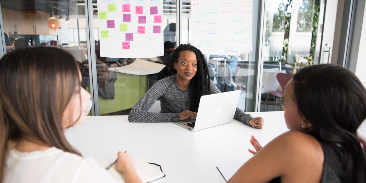 Should Designers Learn to Code? Two tech professionals interviewing a designers for a job